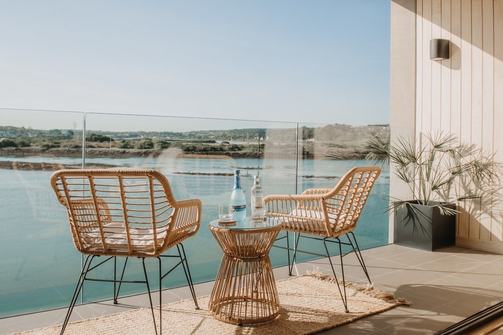 A table and chairs on a patio.
