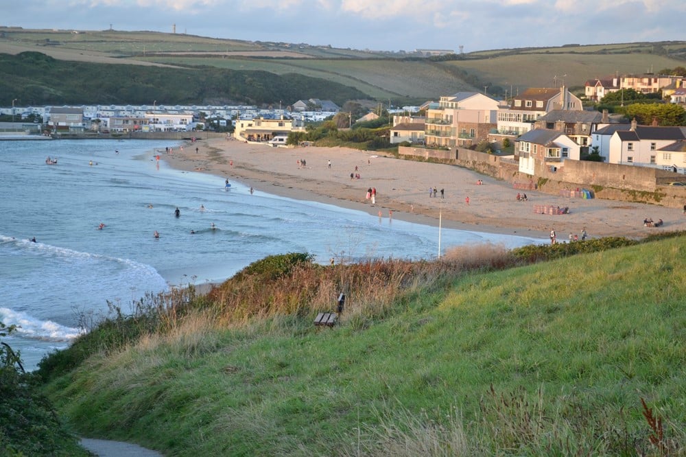 A beach with houses and buildings.