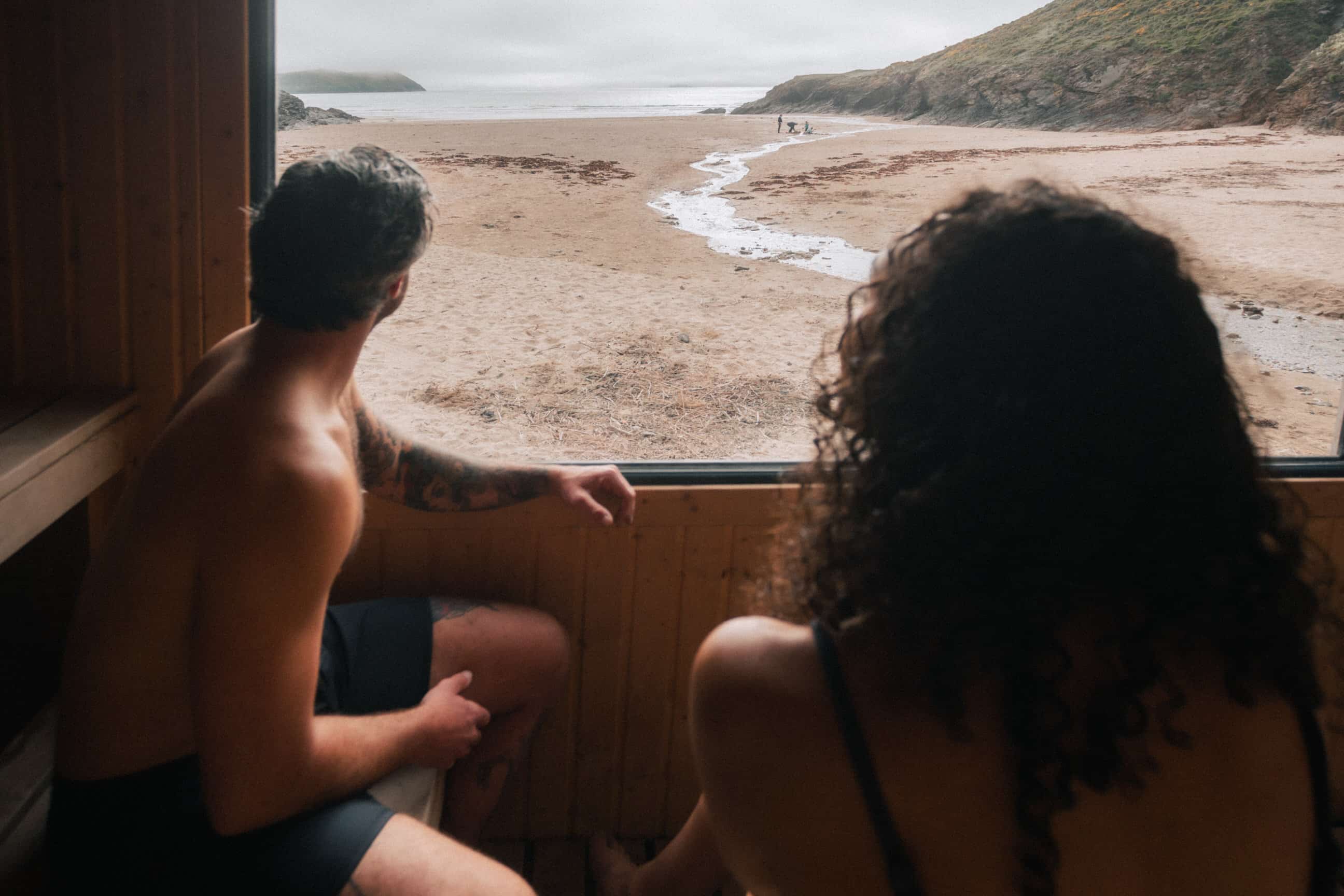 Couple in a sauna on the beach