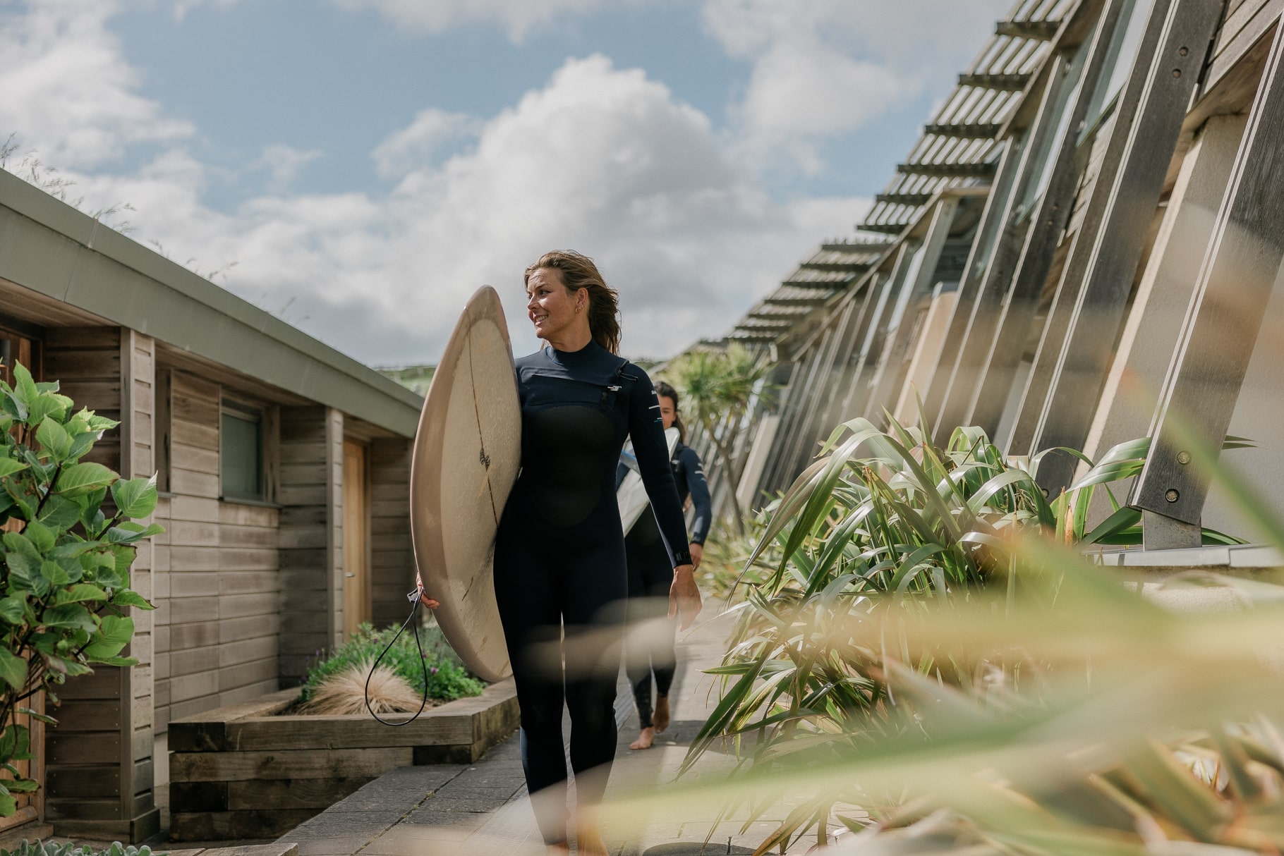 Surfers at The Village in watergate Bay