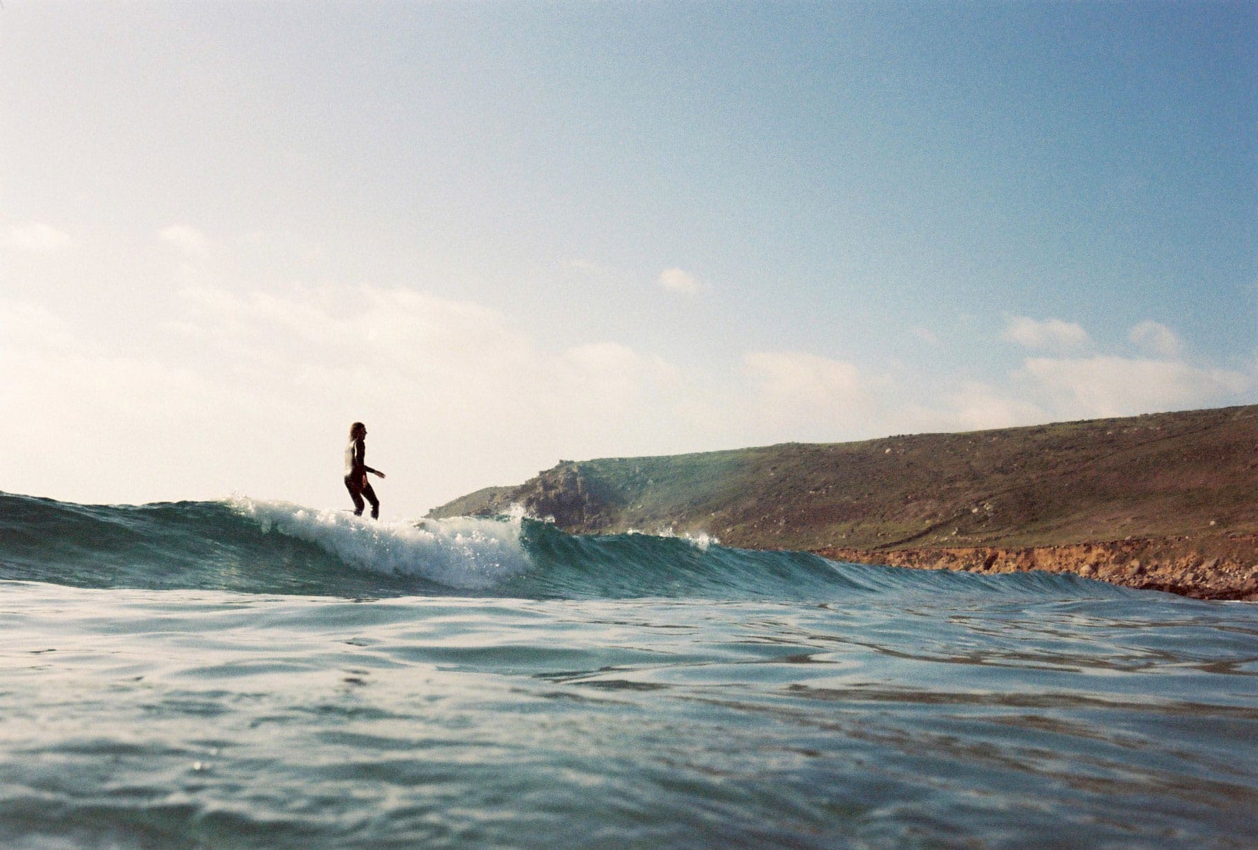 Surfer riding a wave