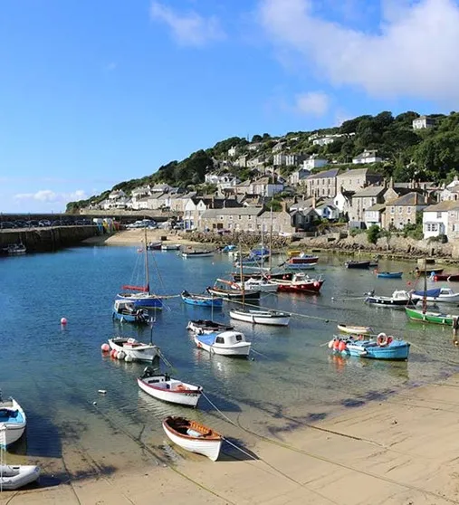 Boats moored in Mousehole Harbour.