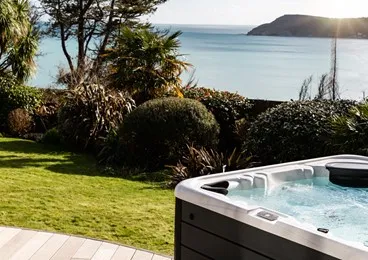 Hot tub with sea views.