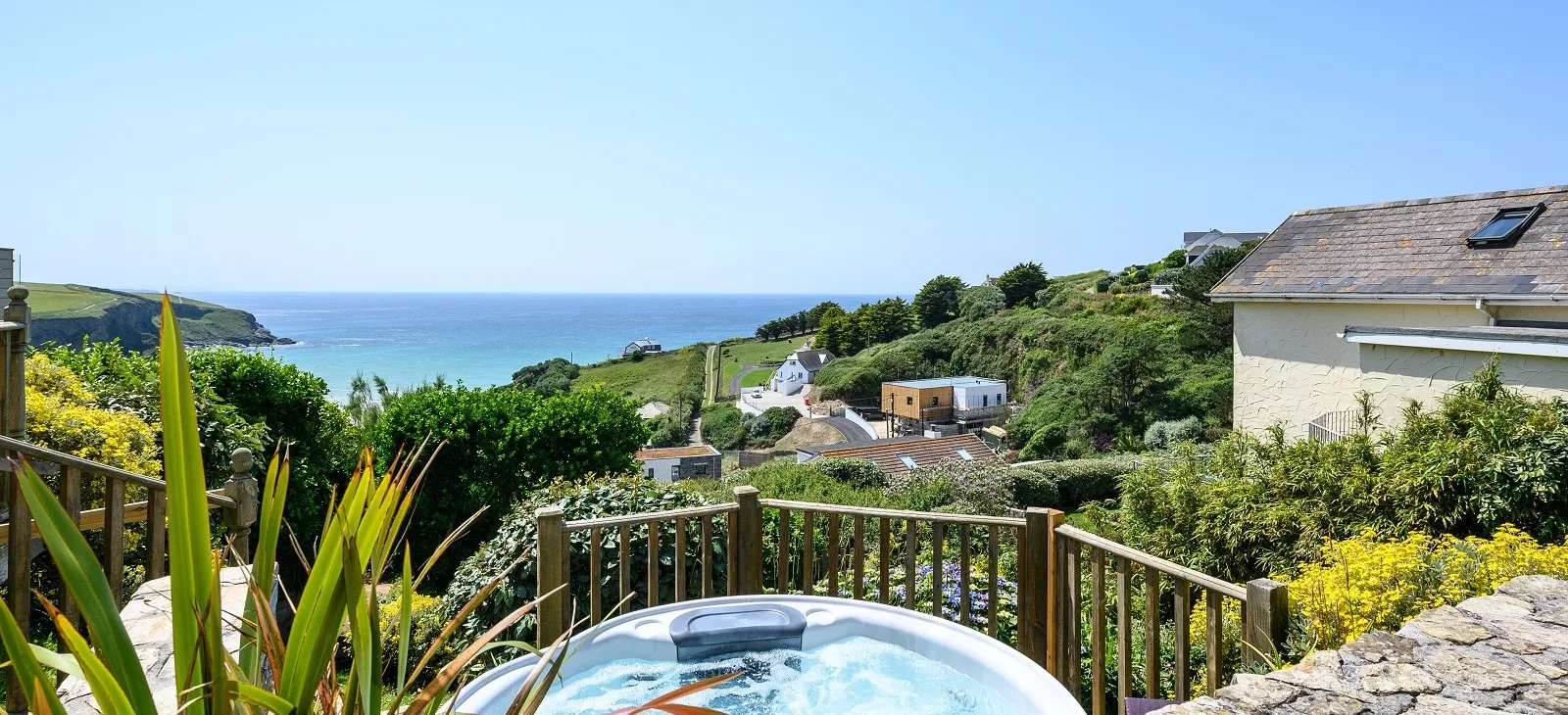 Hot tub overlooking the sea.