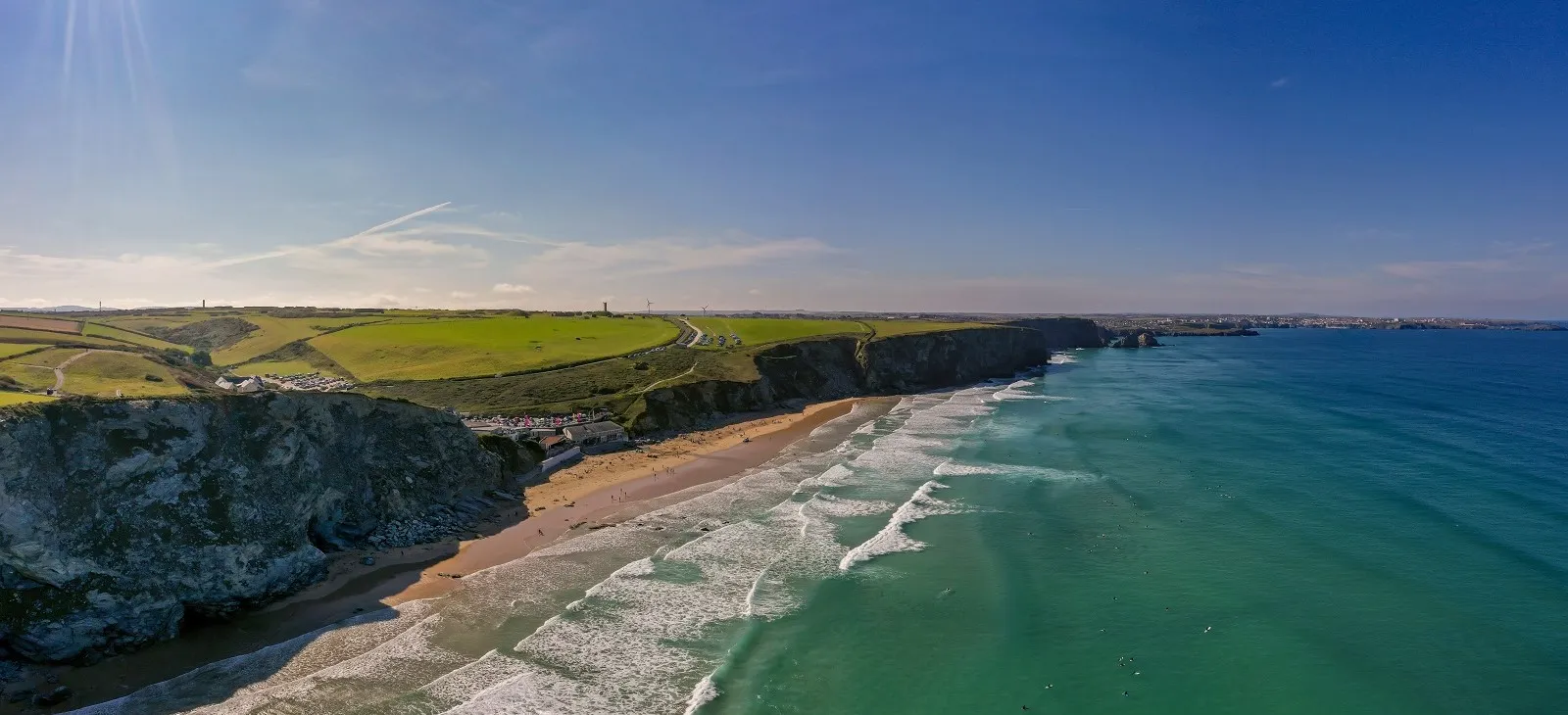 Wide angle shot of a beach on a sunny day.