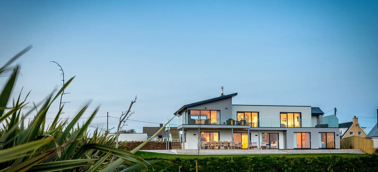 Modern house exterior at dusk.