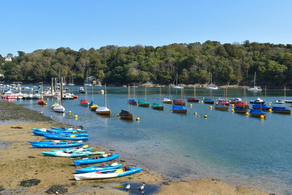 Colourful boats on a river.