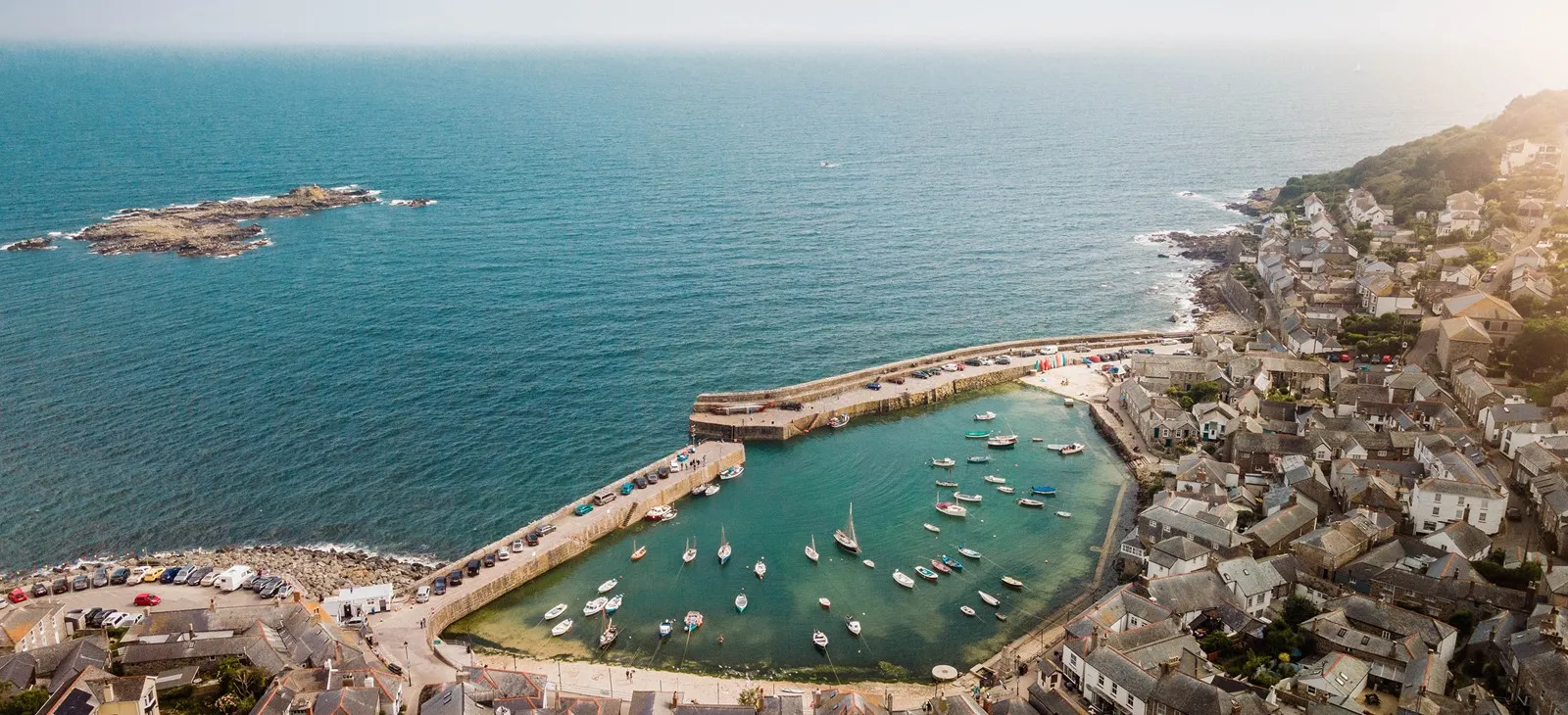 Boats moored in a secluded harbour.