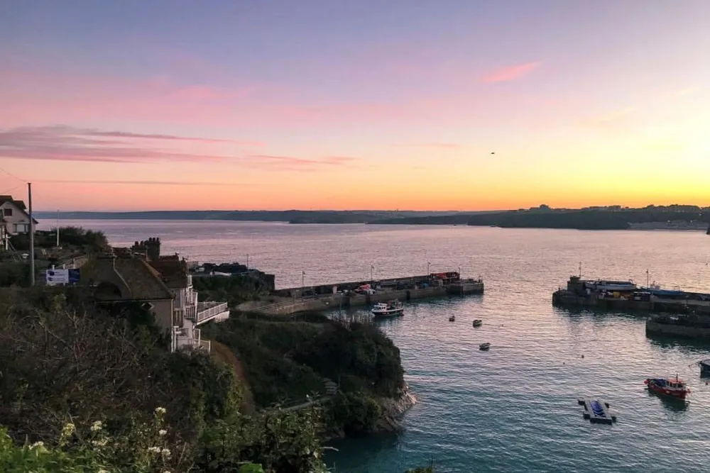 Secluded harbour at sunset.