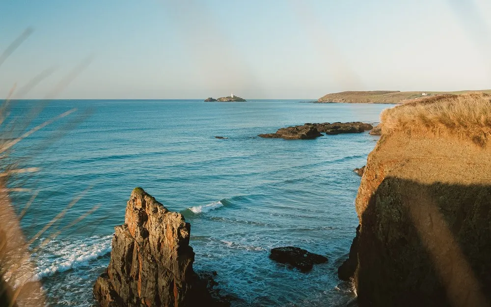 Rocky cliffs and water. 