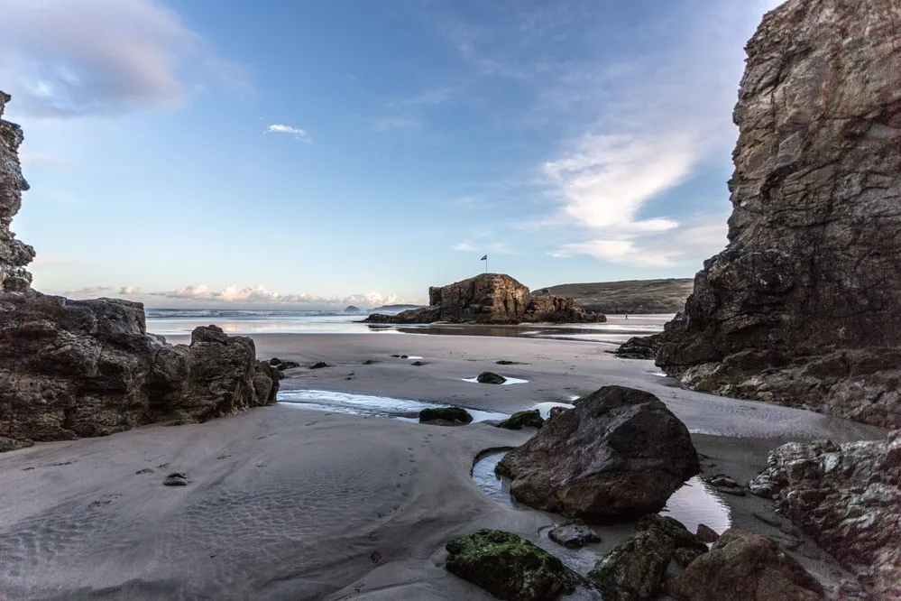 Rocks and rockpools at low tide.