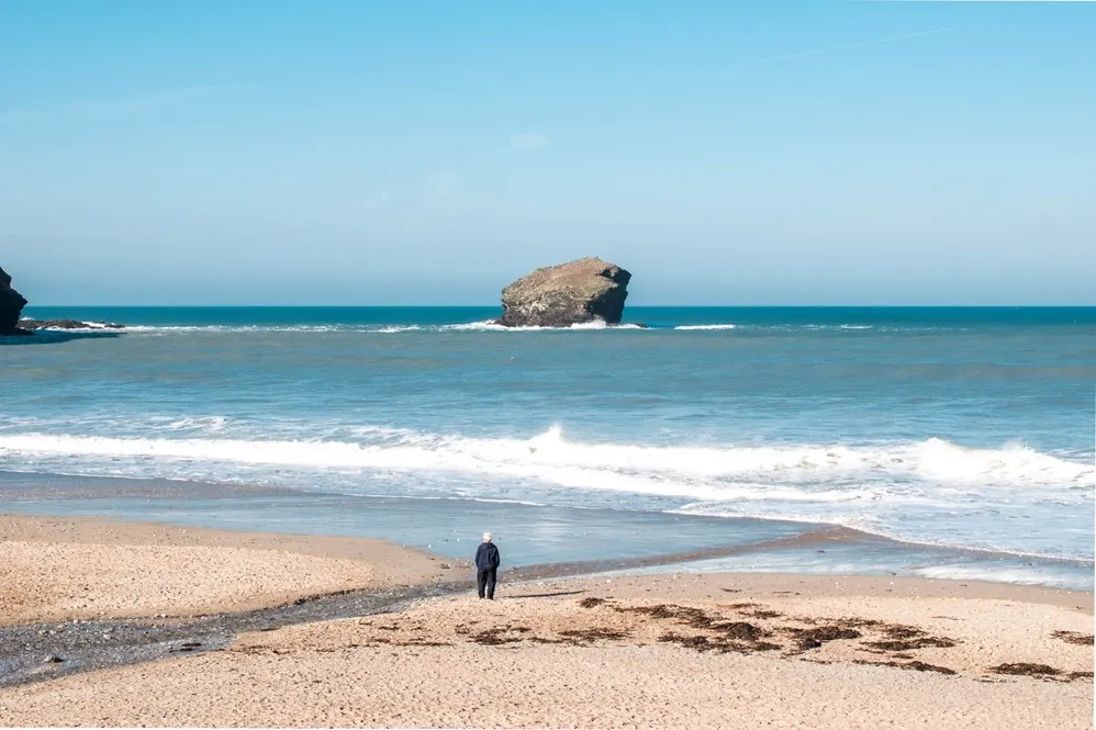 A man looking out to sea.