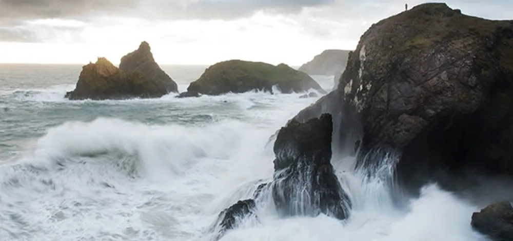 Waves crashing on rocks.