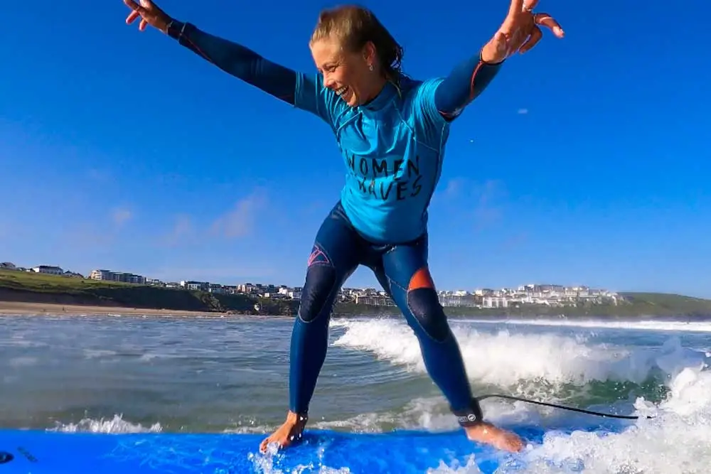 women and waves