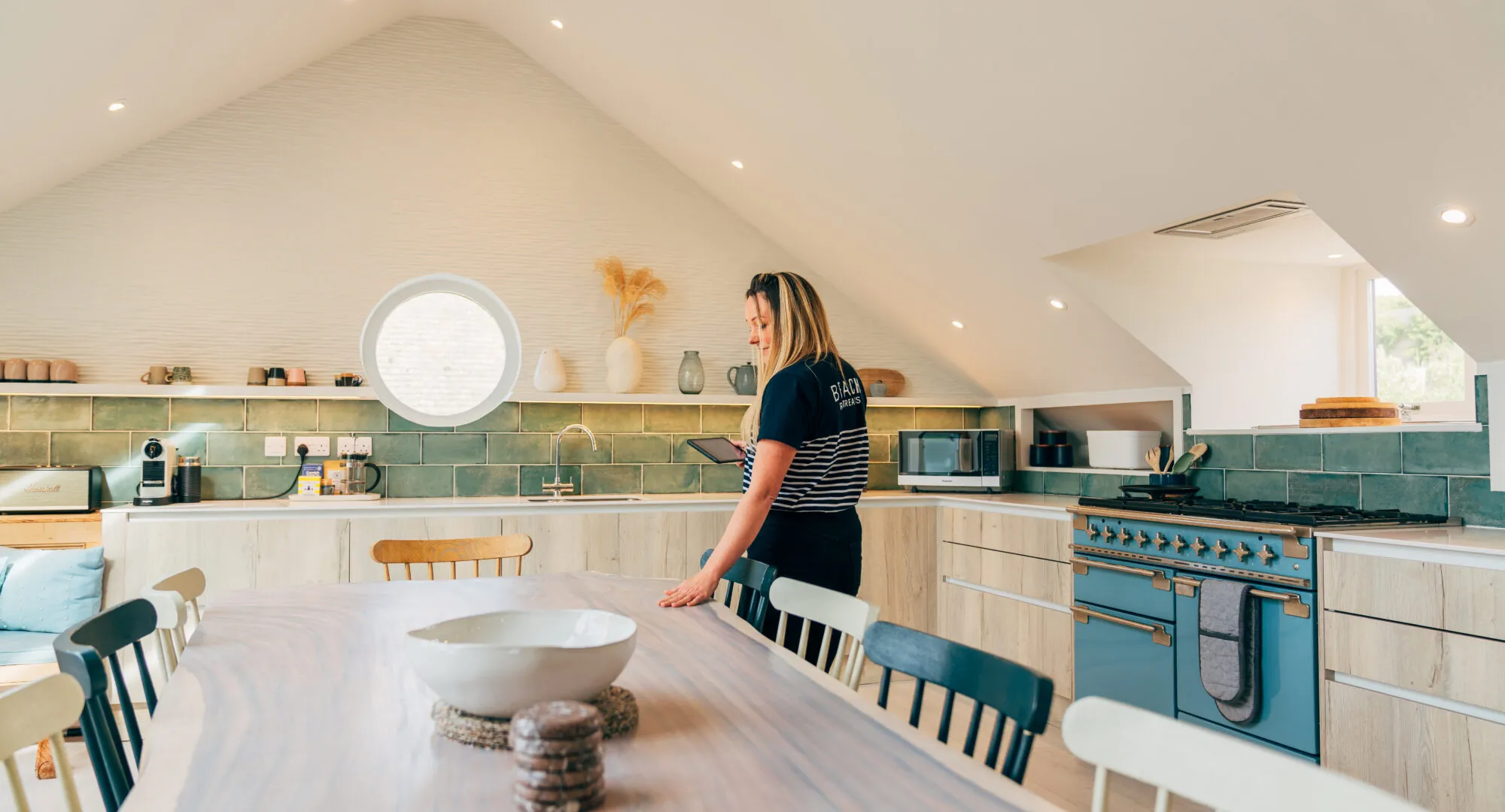 A Beach Retreat's housekeeper cleaning a self-catering property