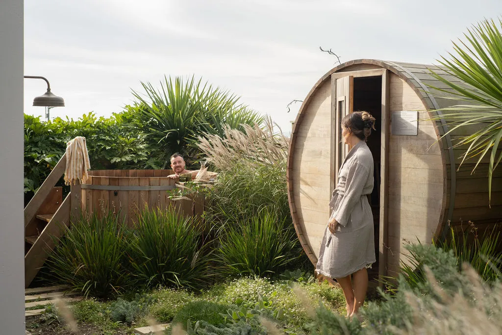 A couple in a sauna and hot tub