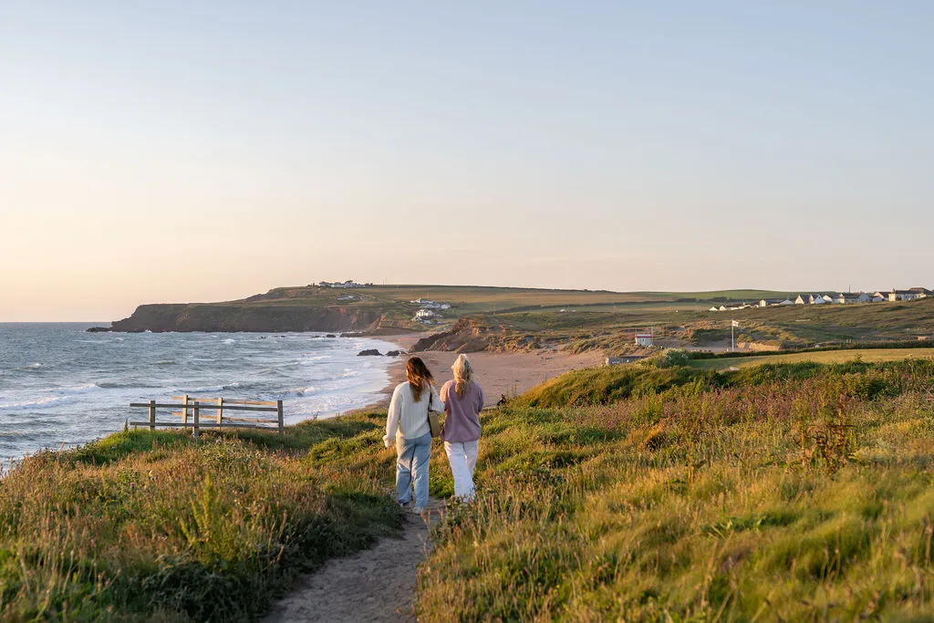 Coastal walkers on Widemouth Bay