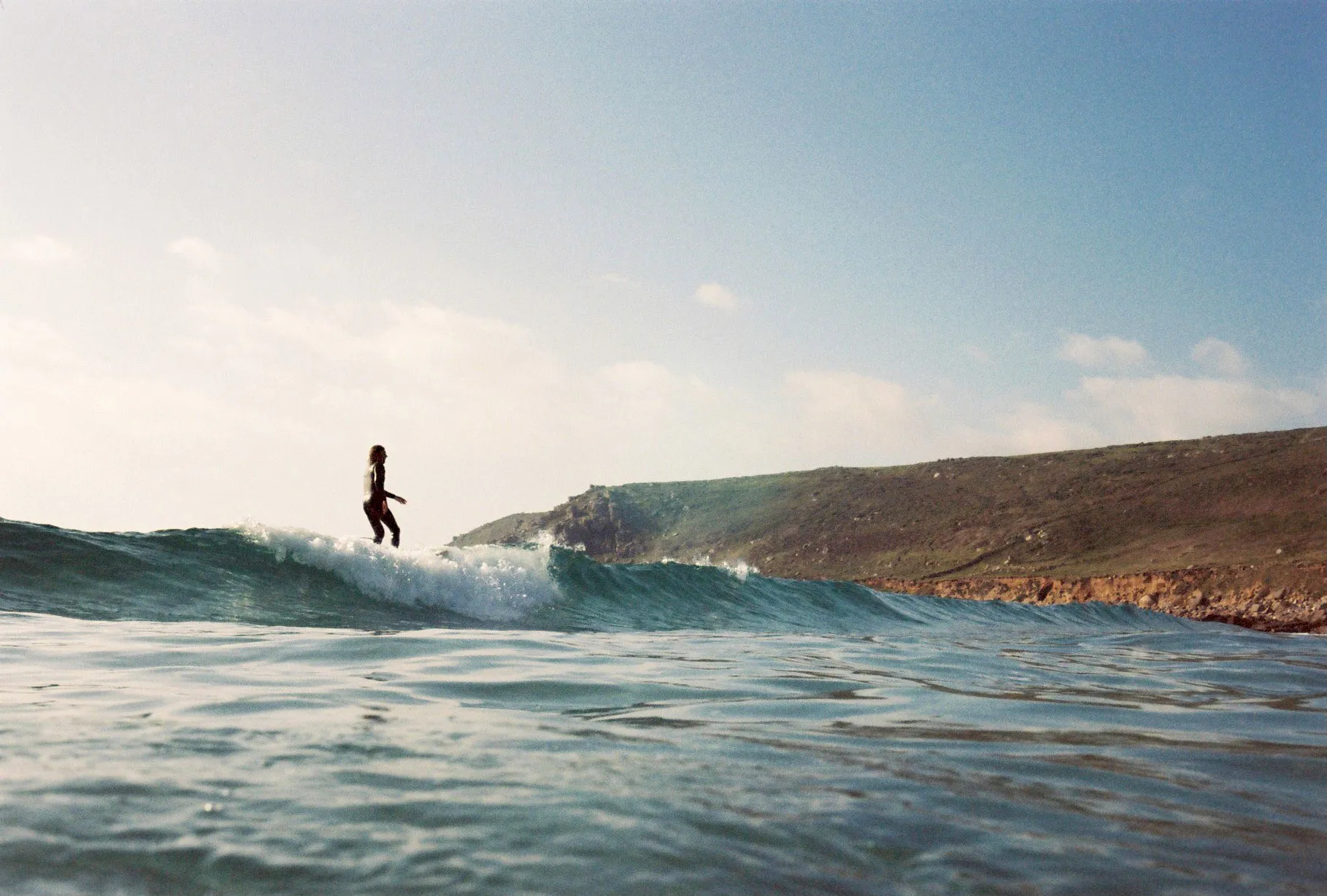 Surfer riding a wave